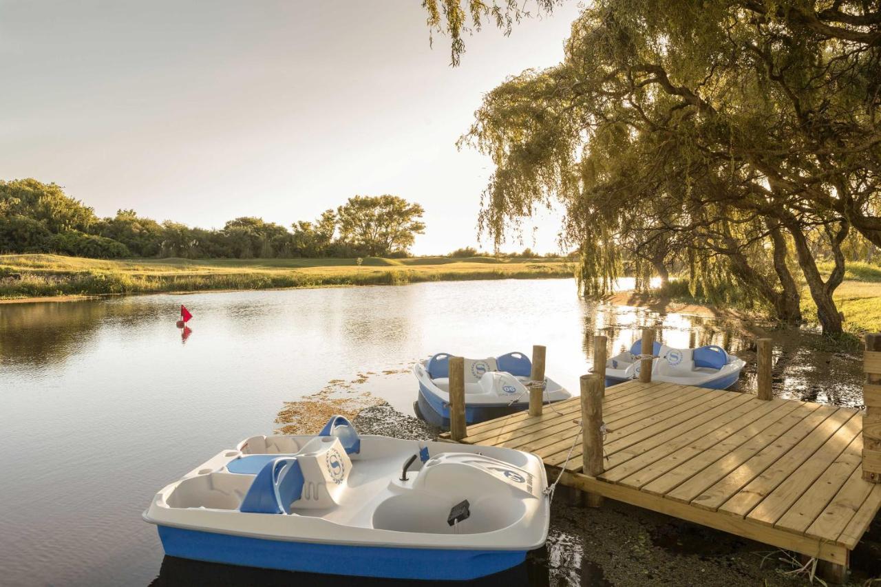 Sheraton Colonia Golf&Spa Resort Colonia del Sacramento Zewnętrze zdjęcie The lake at the park